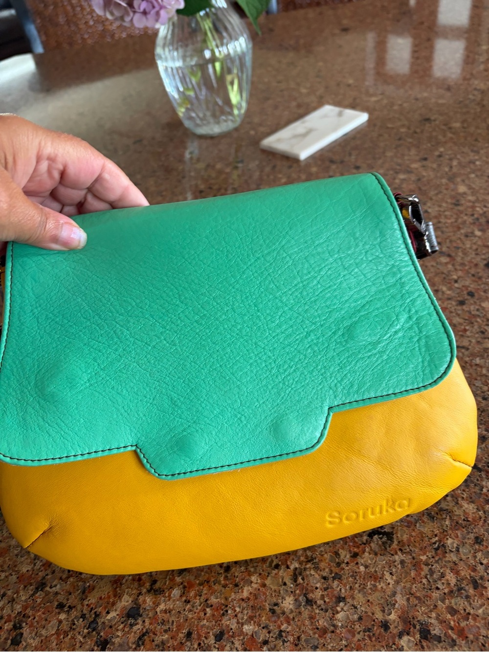 Soruko Green/ Yellow with black dots on reverse side Leather Crossbody Bag.